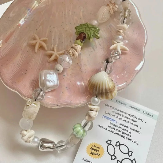 Crystal beaded phone lanyard, phone wrist strap with shells and coconut elements for summer vibe wearing